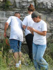 Students studying rocks on a field trip